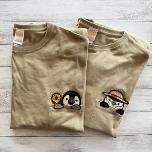 ペンギンワッペンのついたＴシャツ