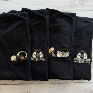 ペンギンワッペンのついたＴシャツ