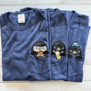 ペンギンワッペンのついたＴシャツ